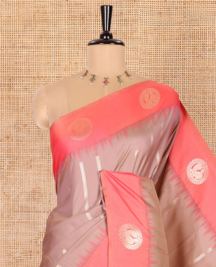 Pale Pink Elite Soft Silk Saree, Gleamed Up with Zari Buttas and Zari Stripes All Over Its Body, Complemented by a Contrast Temple Border of Round Peacock Designs, Rich Pallu of Peacock Chakram Butta Enclosed Checks, and Paired with a Contrast Blouse