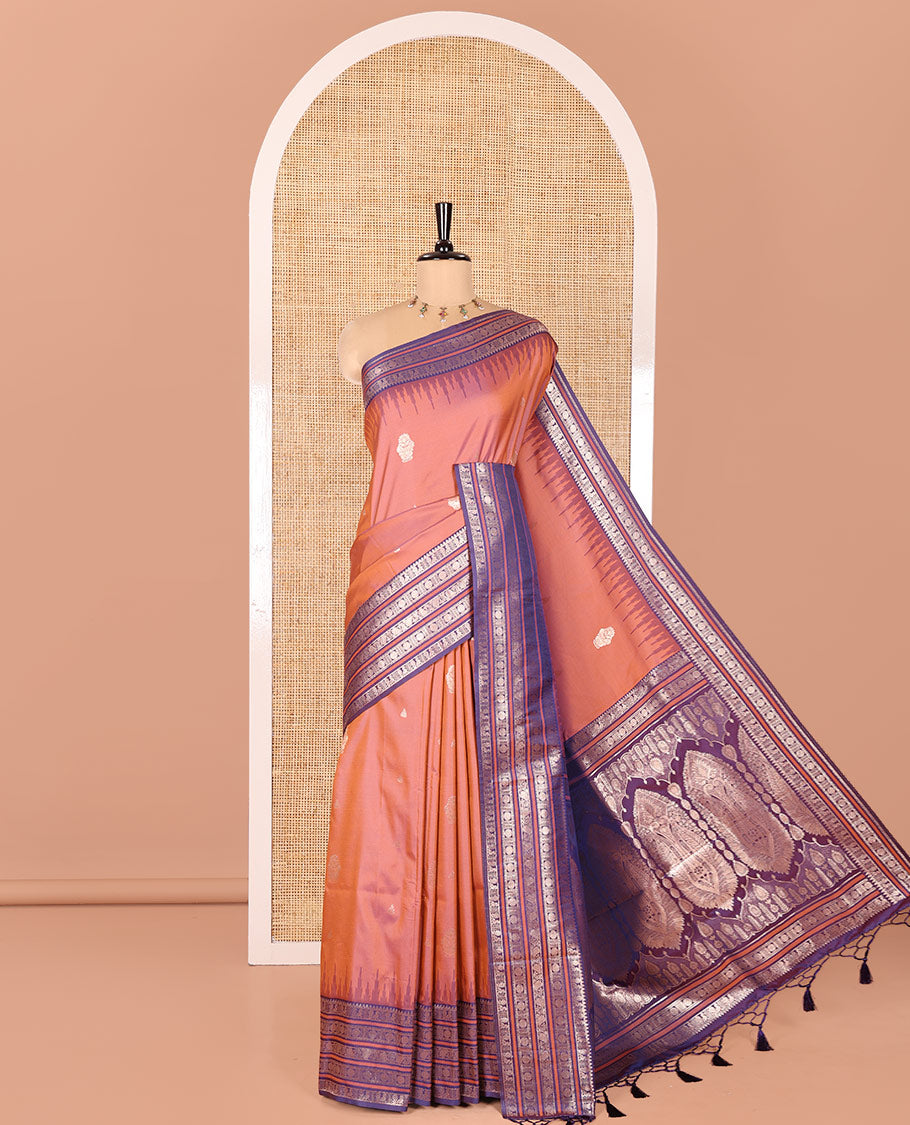 Onion Pink Elite Soft Silk Saree, Adorned with Zari Buttas All Over Its Body, Complemented by Contrast Temple Traditional Zari Border of Peacock-Rudraksham Motifs, Intricately Zari Woven Pallu and Paired with a Contrast Blouse