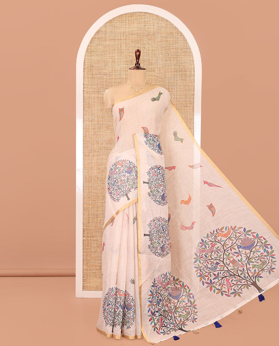 Cream Linen Cotton Saree, Steeped in the Richness of Nature-Themed Motifs Like Bird, Owl, and Tree, a Subtle Piping Border, Pallu of Tree Motifs, and Paired with a Matching Blouse
