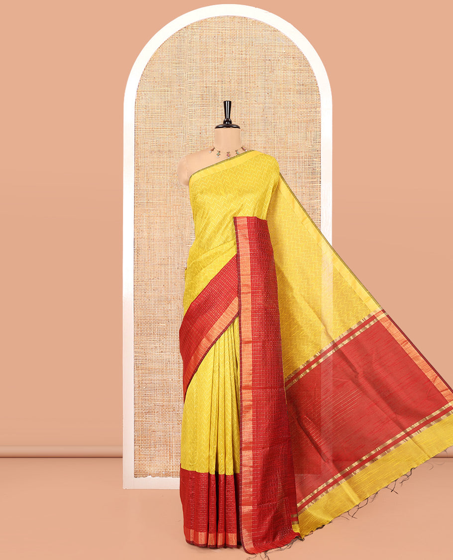 Yellow and Red Semi-Raw Silk Saree, Delicately Woven with Zig-Zag Stripes All Over Its Body, Complemented by Contrast Border of Butta Enclosed Checks, Striped Pallu, and Paired with a Contrast Blouse