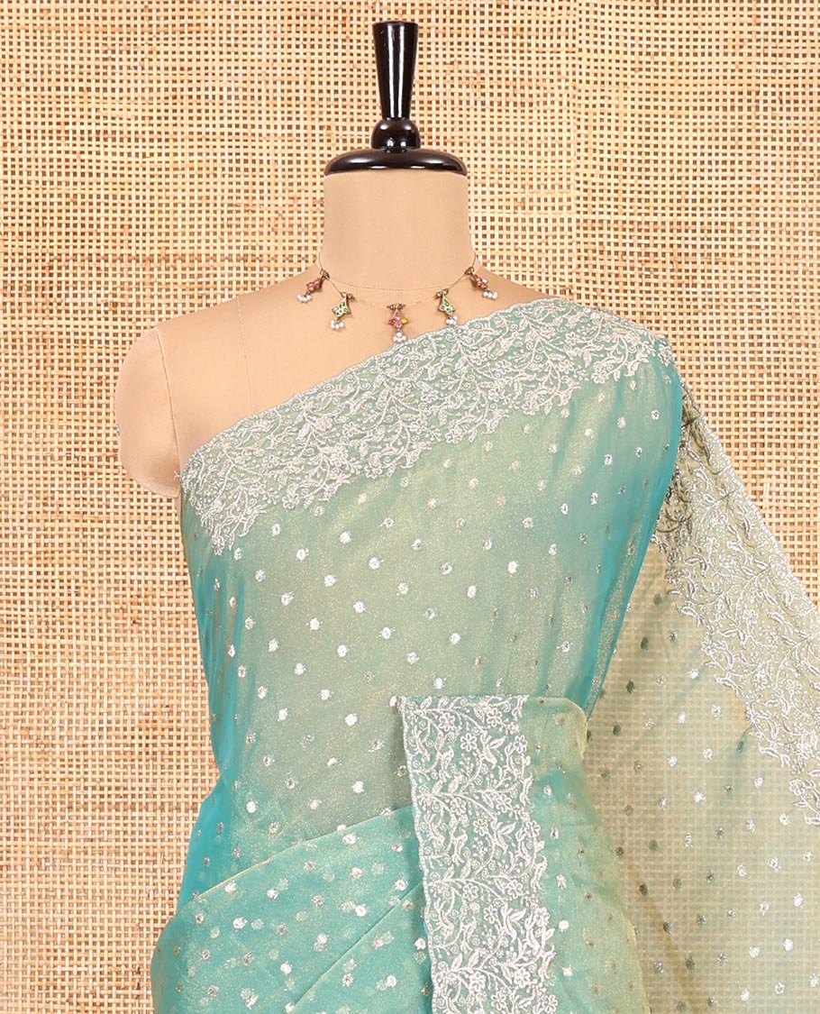 Rama Fendi Chiffon Saree, Steeped with 1000-Buttas All Over Its Body, Highlighted by a Scallop Embroidered Border, a Self-Pallu, and Paired with a Matching Blouse
