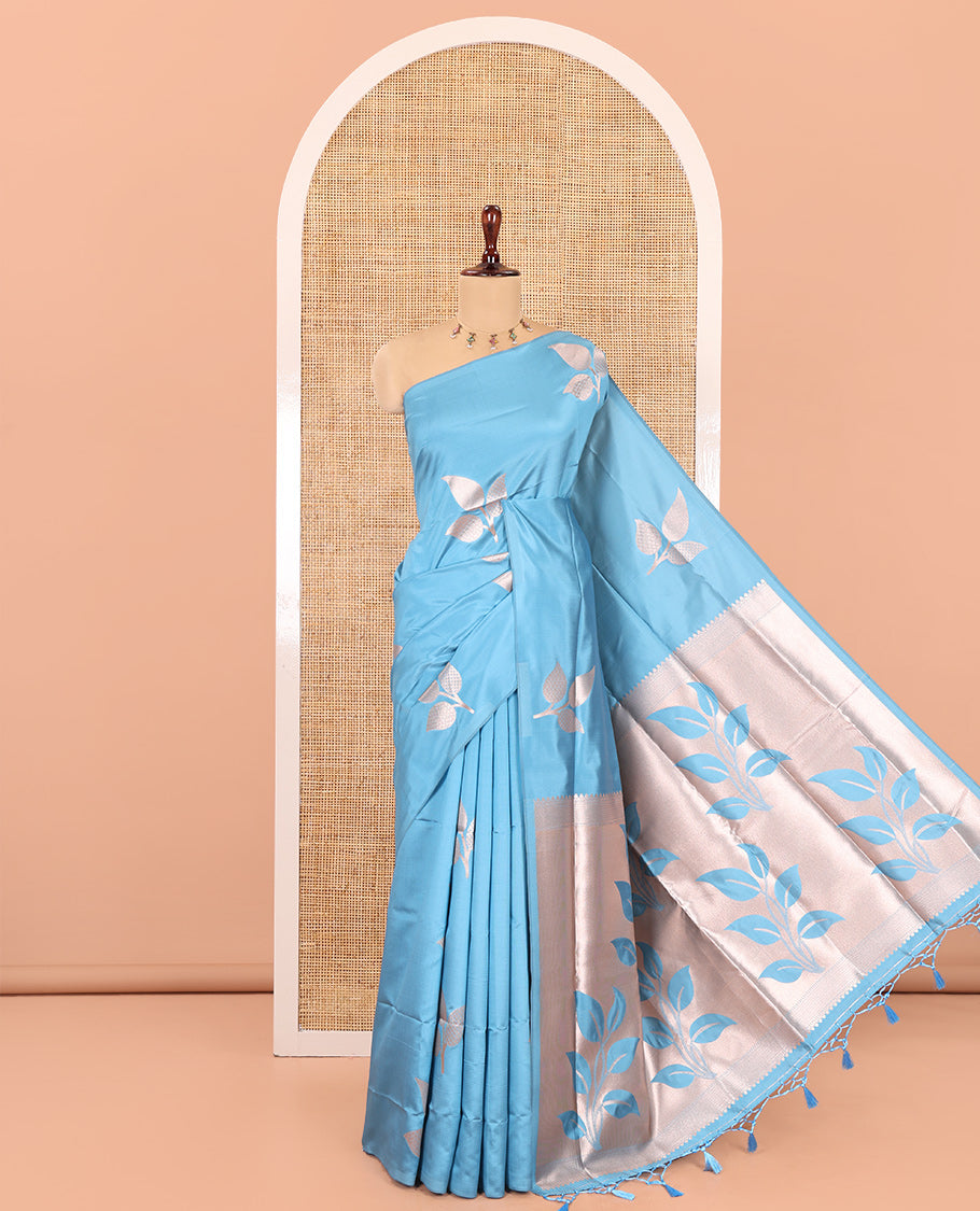 Borderless Blue Elite Soft Silk Saree, Detailed with Leaf Motifs, a Self-Pallu of Floral Designs, and a Matching Blouse
