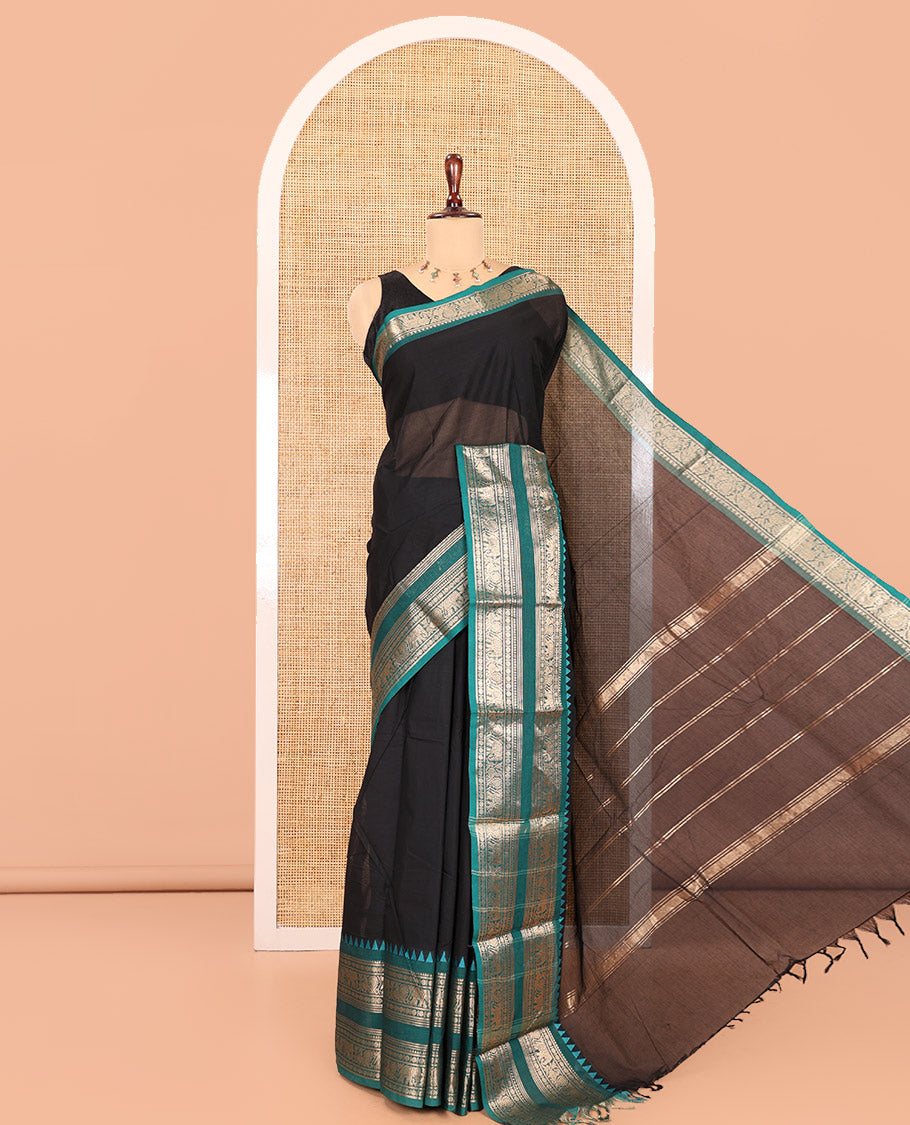 Black Plain Chettinad Cotton Saree, Complemented by a Contrast Peacock-Elephant Temple Border, Striped Pallu, and a Matching Blouse