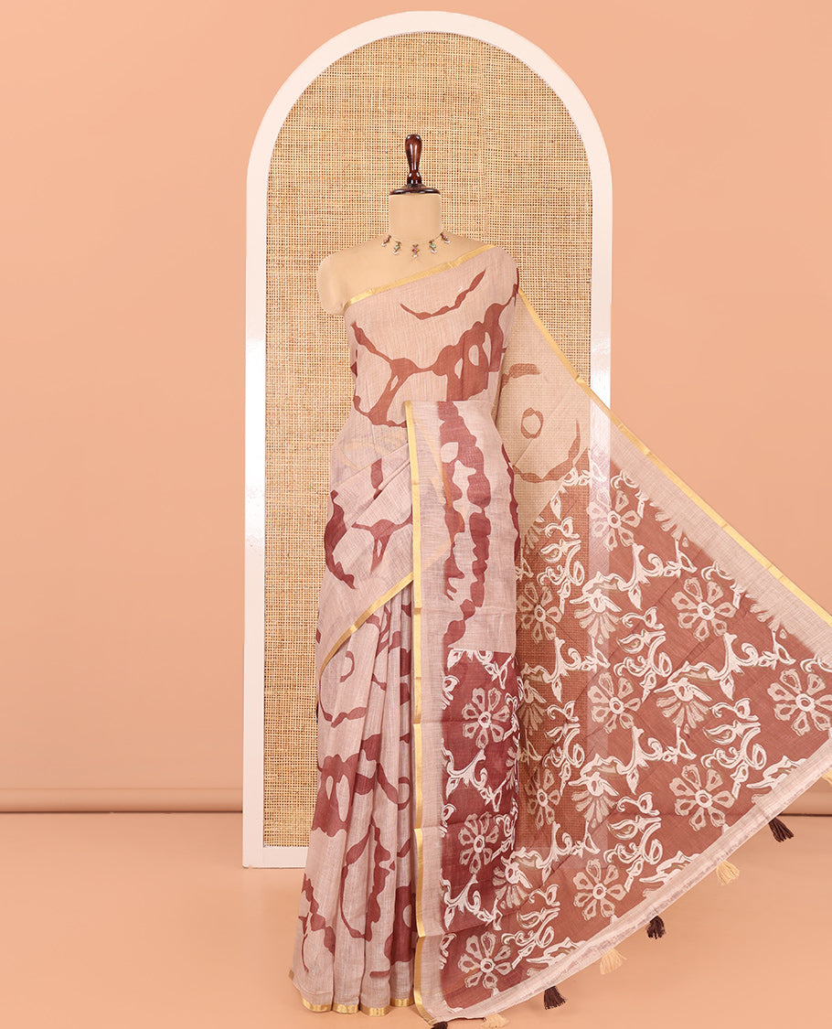 Chikku Linen Cotton Saree, Adorned with Shibori Print, Gold Piping Border, Contrast Floral Printed Pallu, and Contrast Floral Printed Blouse