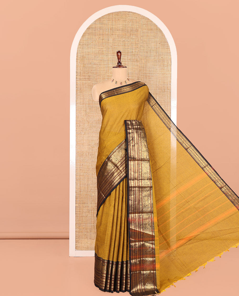 Mustard Plain Chettinad Cotton Saree, a Contrast Traditional Yaali-Elephant Zari Border, Striped Pallu, and a Matching Blouse