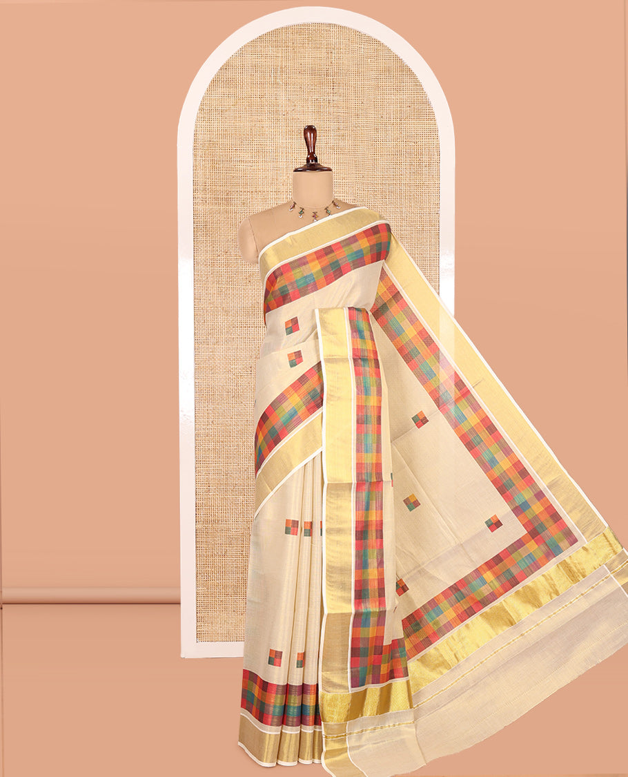 Gold-Purple Kerala Tissue Cotton Saree Features Madras Checked Buttas, a Zari Checked Border, and a Contrast Blouse