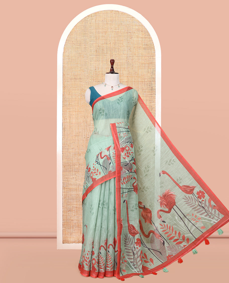 Green Linen Cotton Saree, Prettified with Floral Crane Motifs Print, a Contrast Border, and a Contrast Blouse