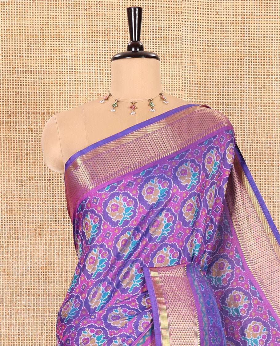 Royal Blue Patola Saree Accentuated with Ikkat-Style Buttas Enclosed Round Design, Complemented by a Contrast Traditional Zari Design Border, Featuring Intricate Ikkat Style Pallu, and Paired with a Contrast Blouse
