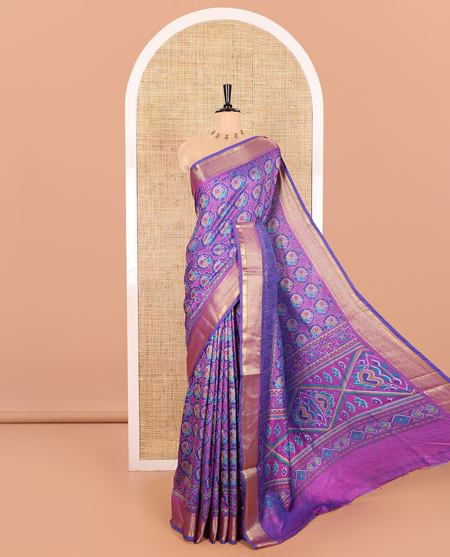 Royal Blue Patola Saree Accentuated with Ikkat-Style Buttas Enclosed Round Design, Complemented by a Contrast Traditional Zari Design Border, Featuring Intricate Ikkat Style Pallu, and Paired with a Contrast Blouse