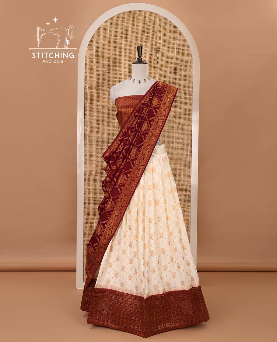 Cream semi-banaras half-saree, zari buttas & contrast Swarovski stonework traditional border skirt, jacquard blouse & contrast jaal jacquard maroon dhavani
