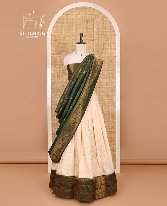 Cream-bottle green half-saree, zari jacquard & contrast traditional zari border banaras softy skirt, semi-banaras jacquard blouse & contrast zari design blouse