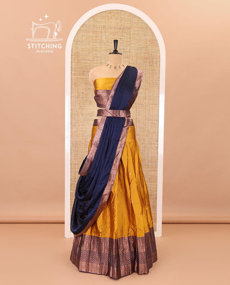 Mustard-blue taffeta half-saree, zari buttas with contrast traditional zari bordered skirt, a matching blouse, and contrast zari border dhavani with belt