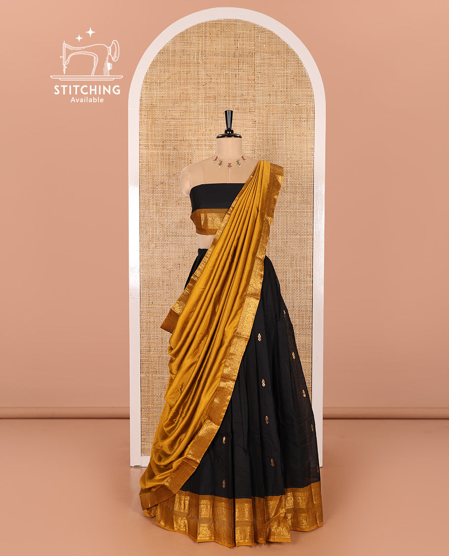 Black and Mustard Chettinad Cotton Half-Saree Featuring Buttas Woven Skirt, Highlighted with a Contrast Rettai Pettu Peacock Motifs Woven Zari Border, a Subtly Woven Matching Blouse, and a Vichitra Silk Contrast Traditional Zari-Bordered Dhavani