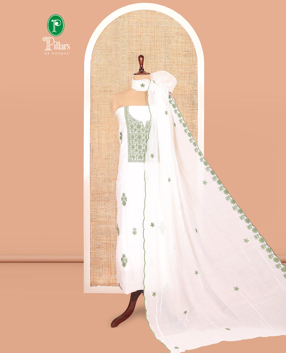White-Leaf Green Mul Chanderi Material Churidar Features a Floral-Themed Thread-Embroidered Top, a Plain Santoon Bottom, and Thread Embroidered Dupatta