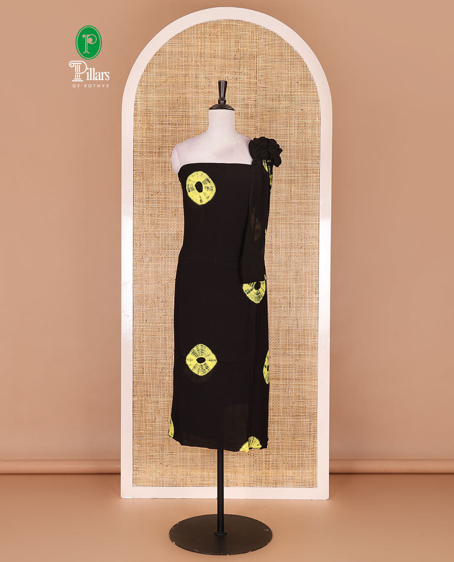 Black and yellow viscose georgette material churidar set, big bandhani dots printed top, plain bottom, and big bandhani dots printed dupatta