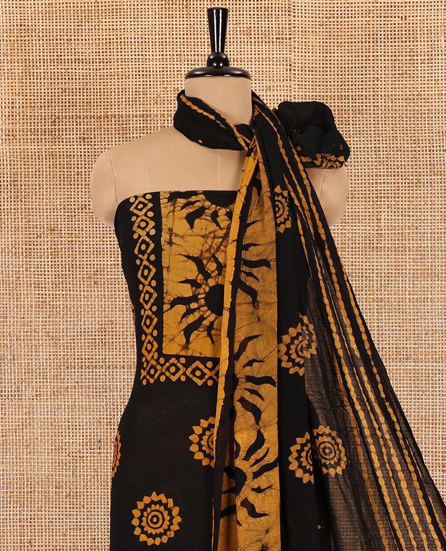Black and mustard material chudidar set, sun brust and chakra motifs hand block printed Viscose georgette top, contrast bottom, and hand block printed viscose georgette dupatta