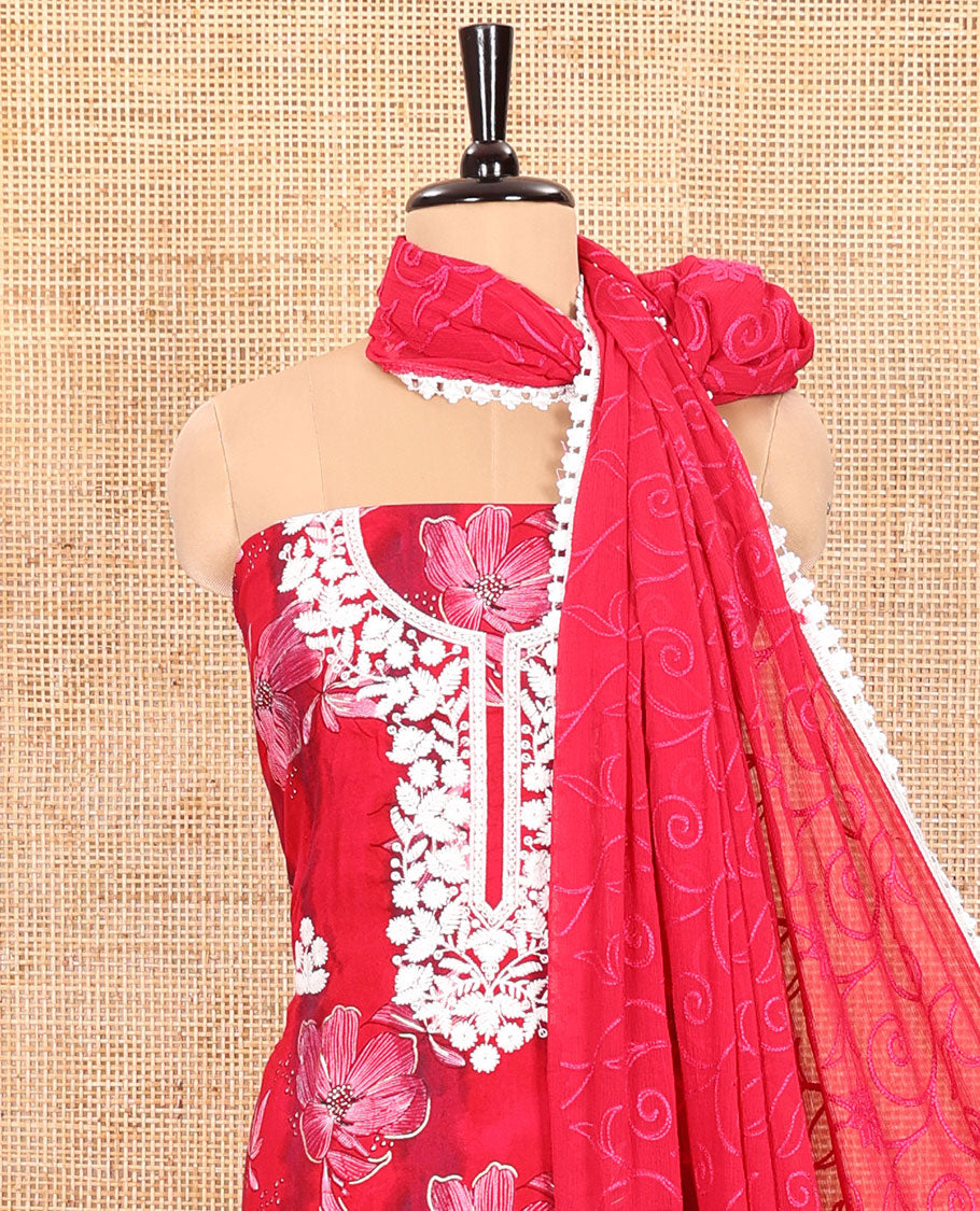 Tomato Pink Material Chudidar Set Adorned with Phulkari-Style Floral Embroidery and Floral Print Rayon Top, Subtly Made Plain Rayon Bottom, and a Chiffon Georgette Dupatta of Floral Theme Designs