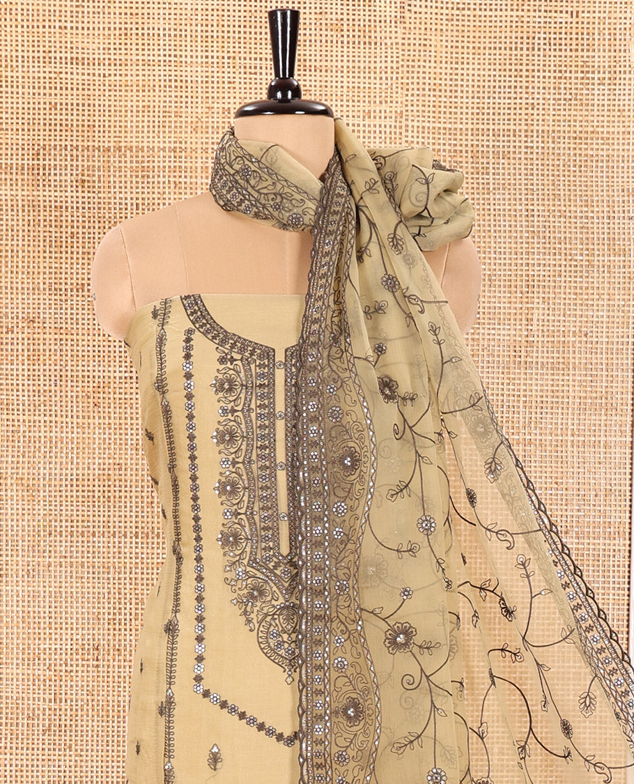Golden Material Chudidar Set Adorned with Embroidered Organza Chiffon Top, Subtly Made Plain Santoon Bottom, and a Organza Dupatta Featuring Floral Jaal Embroidery