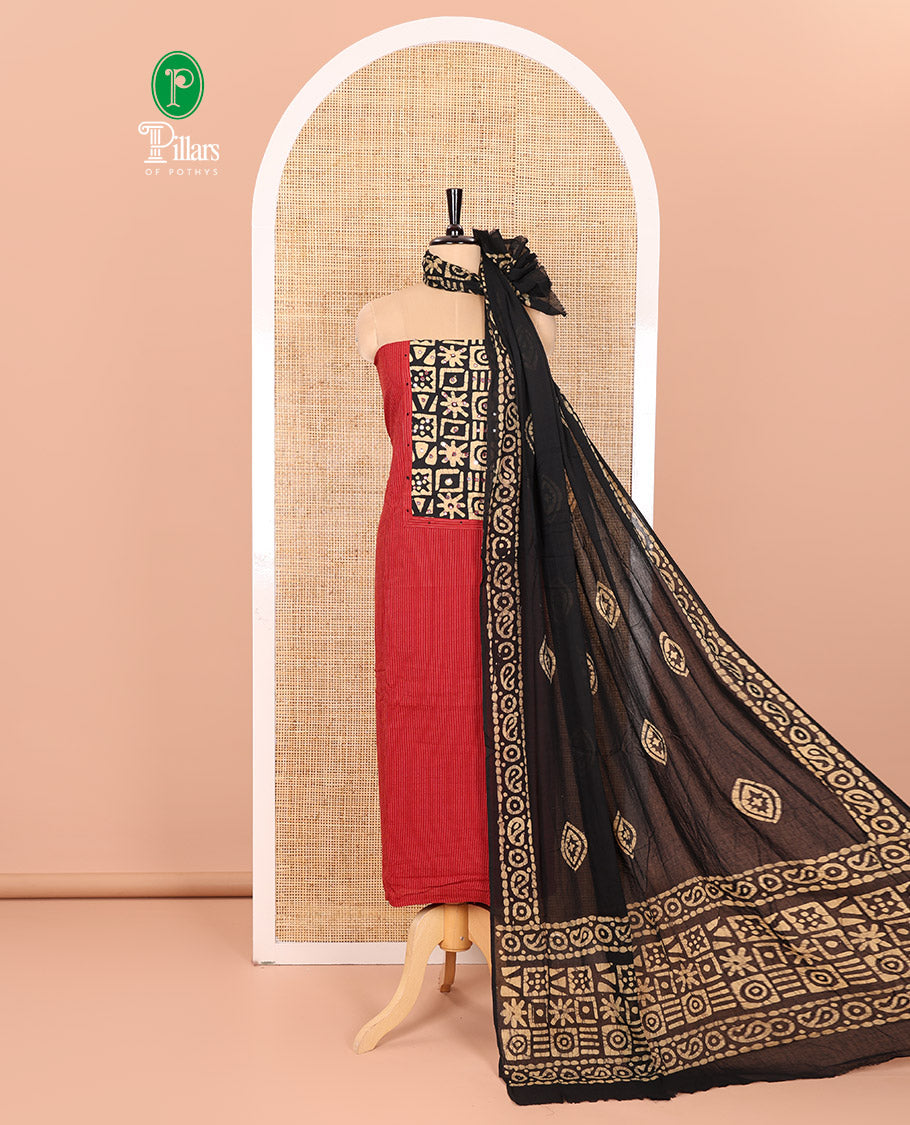 Red Material Chudidar Set Prettified with Kantha Embroidery, Batik Print, and Mirror Work on the Cotton Top, Comes with a Batik Geometric Patterns Printed Bottom, and a Cotton Batik Geometric Printed Dupatta