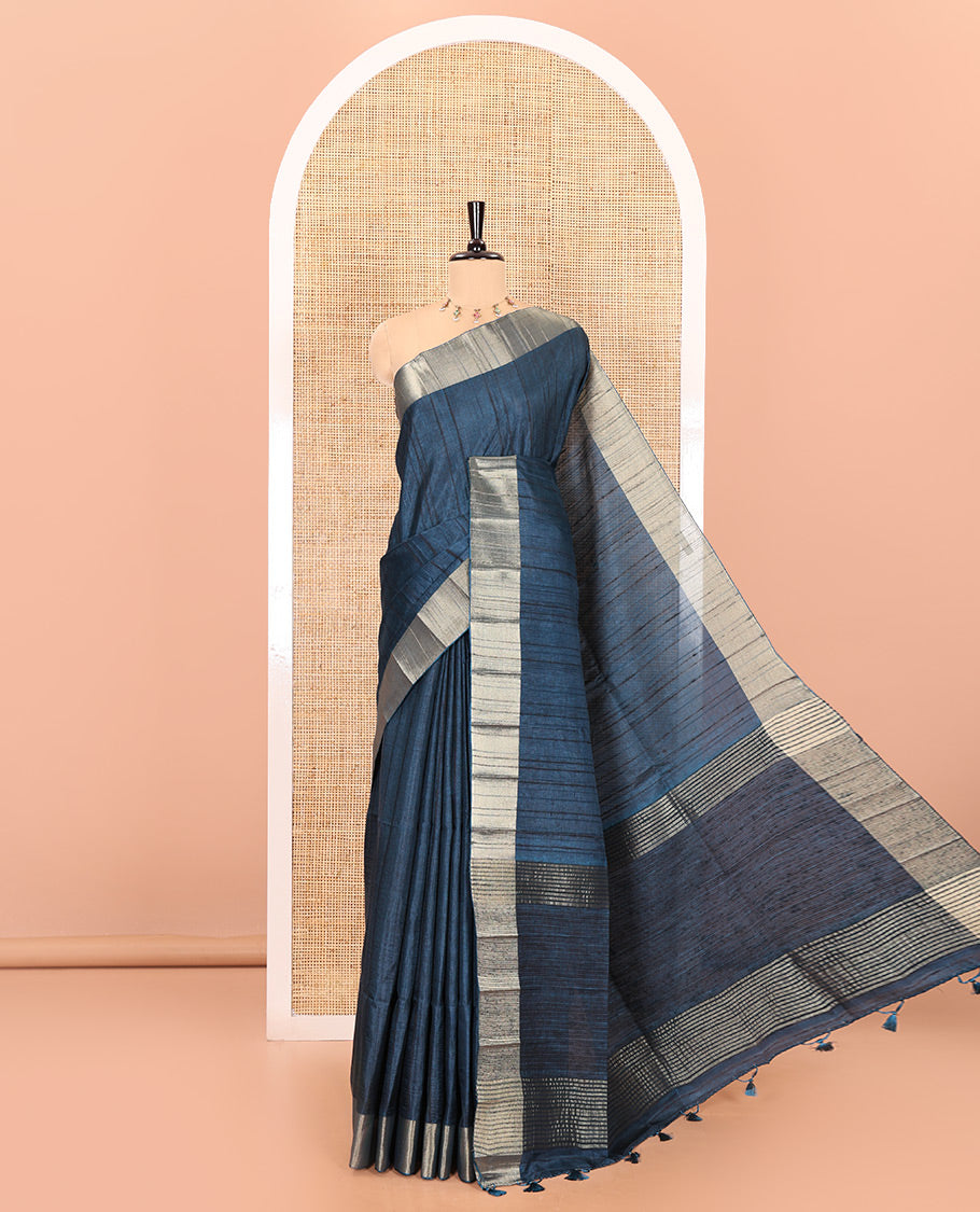 Peacock blue plain ghicha woven fancy tussar silk saree, tissue small border, striped pallu, and a matching blouse