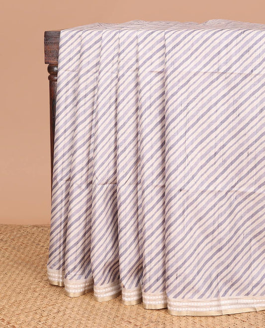 Grey geometrical block print fancy tussar saree with zari diamond thread woven border & block print pallu along with printed blouse