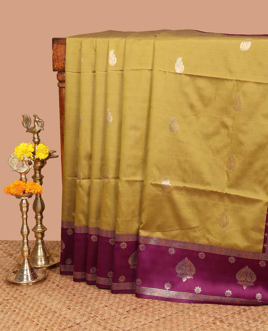 Mehendi green semi soft silk saree with peacock border & rich pallu along with plain blouse