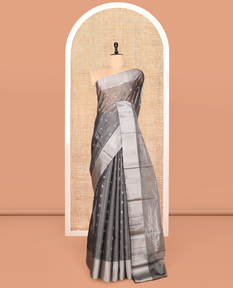 Grey Silk Cotton Saree, Gleamed up with Buttas, a Subtle Bavanji Border, Grand Geometric Patterned Pallu, and a Matching Blouse