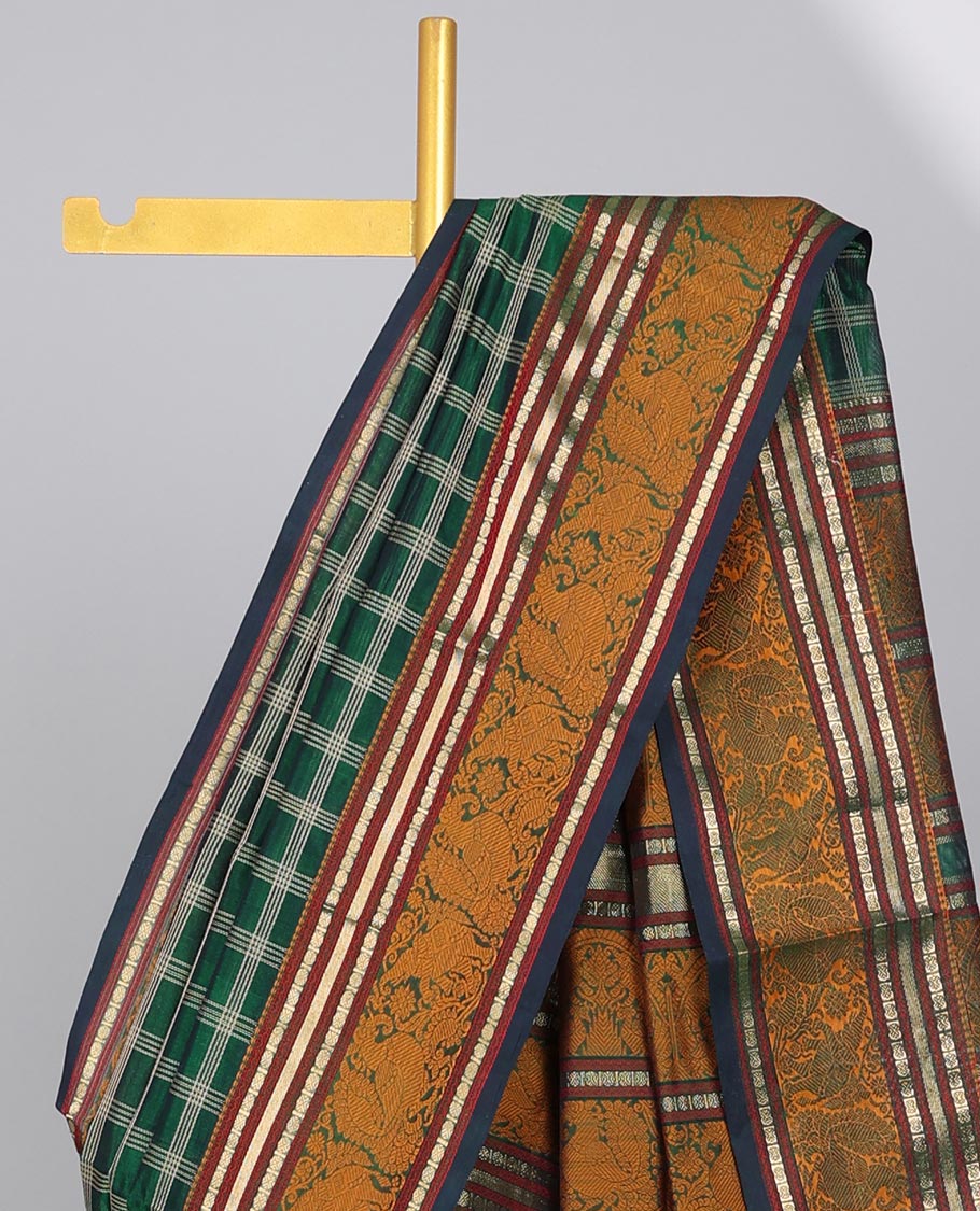 Green checked design cotton silk saree with contrast striped design border & intricate zari design pallu