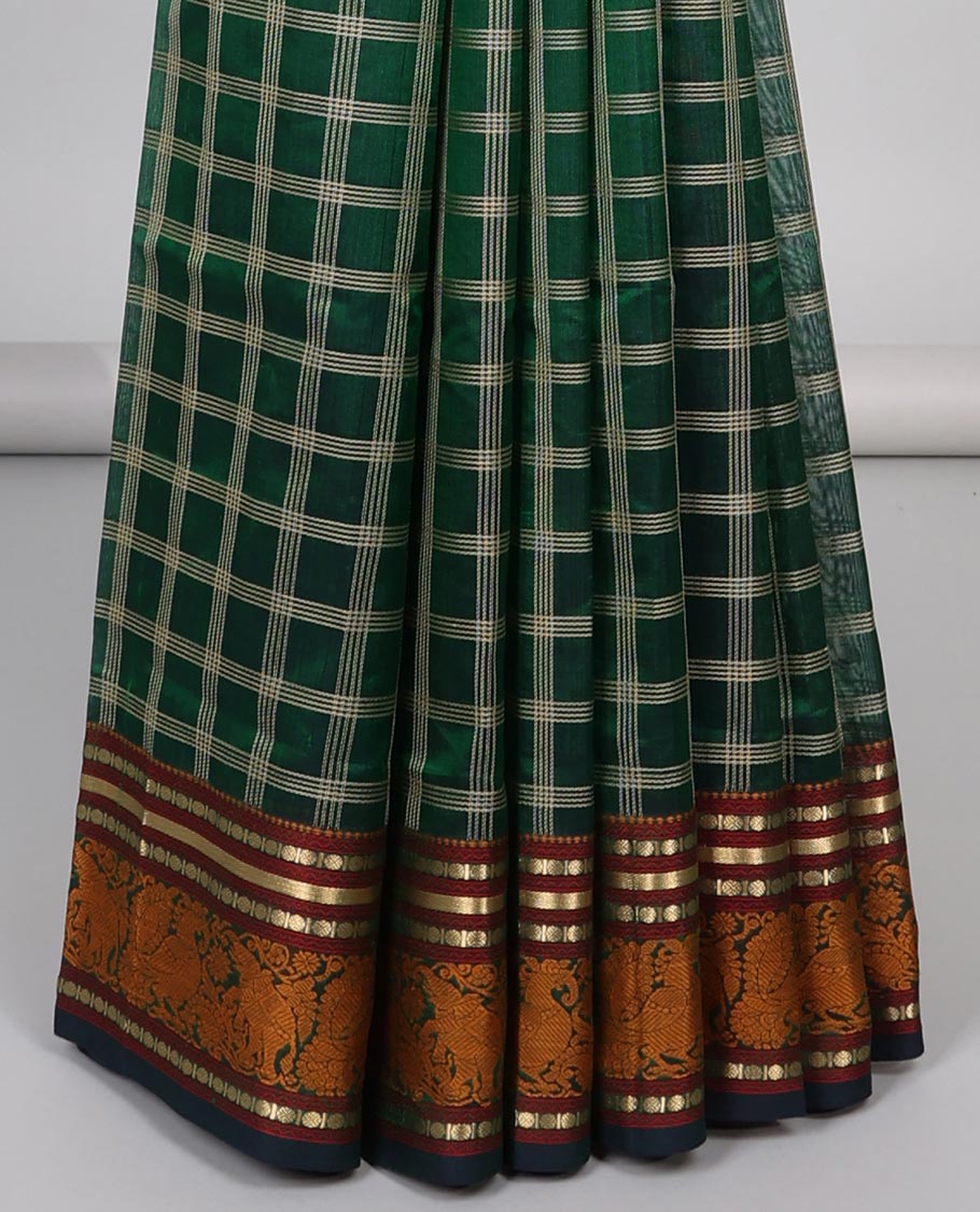 Green checked design cotton silk saree with contrast striped design border & intricate zari design pallu