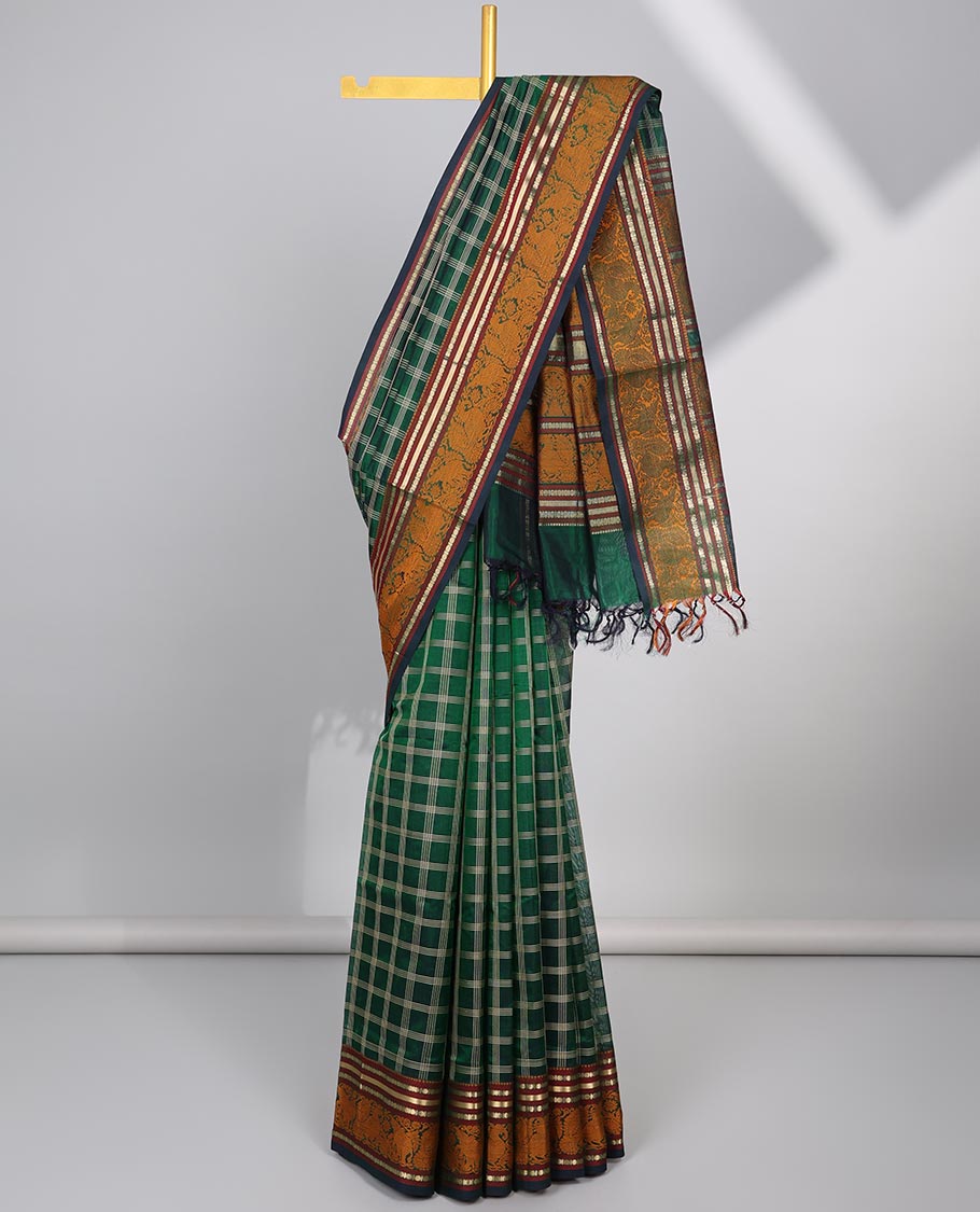 Green checked design cotton silk saree with contrast striped design border & intricate zari design pallu
