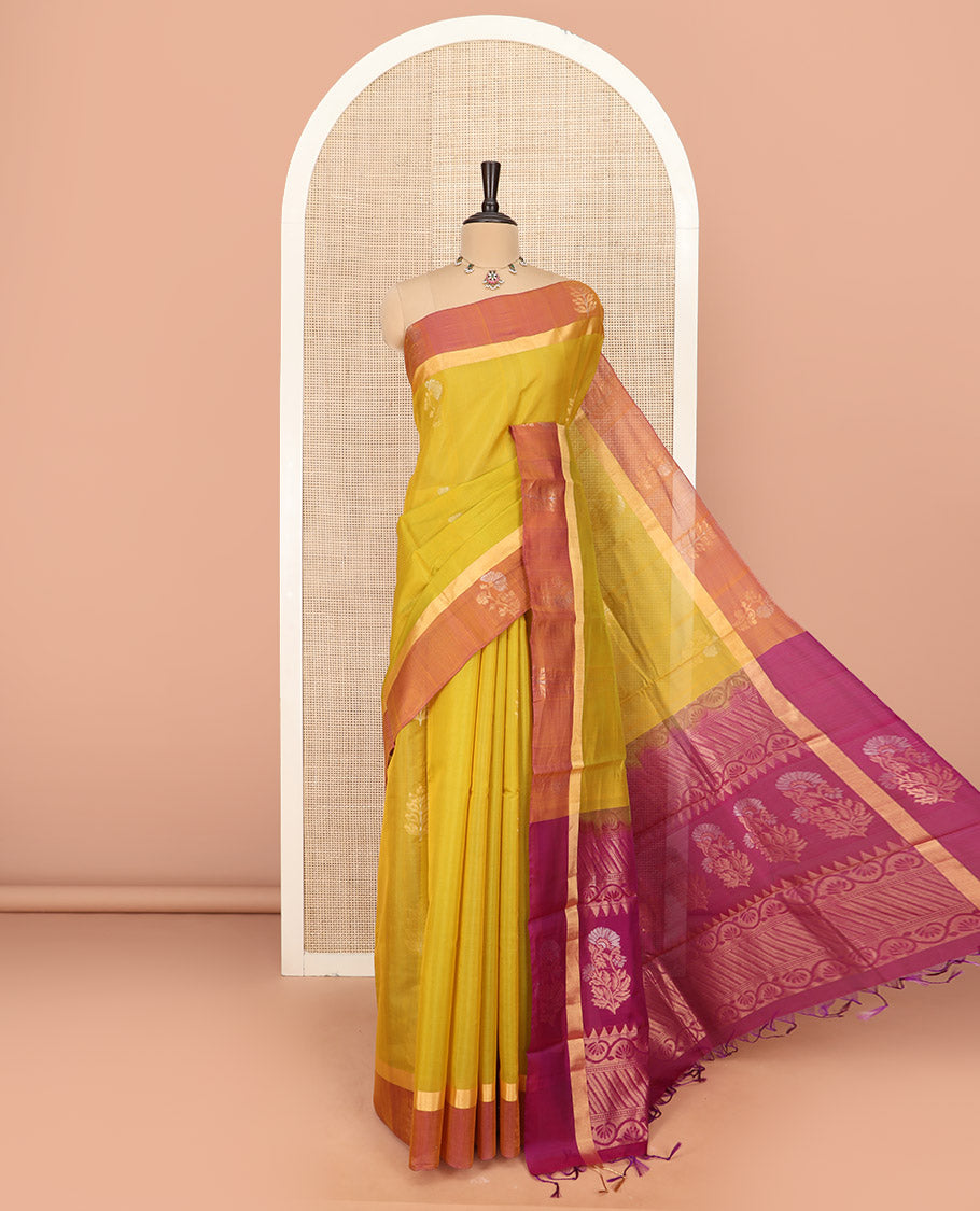 Green Silk Cotton Saree Graced with Floral Buttas All Over the Body, Complemented by a Contrast Floral Zari Motifs Woven Border, Featuring a Contrast Pallu of Floral- Geometric Zari Designs, and Paired with a Contrast Blouse