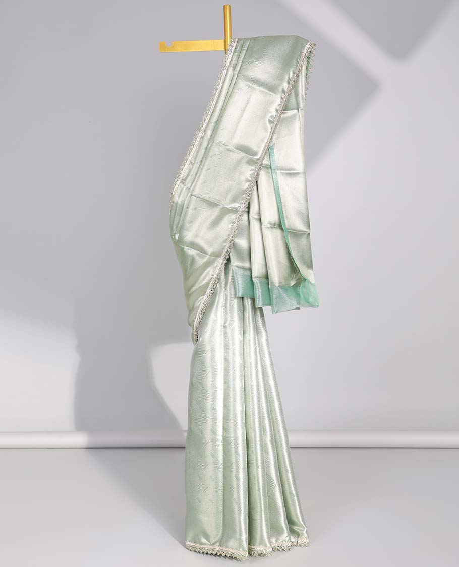Mint green geometric design with self zari design border & intricate design pallu