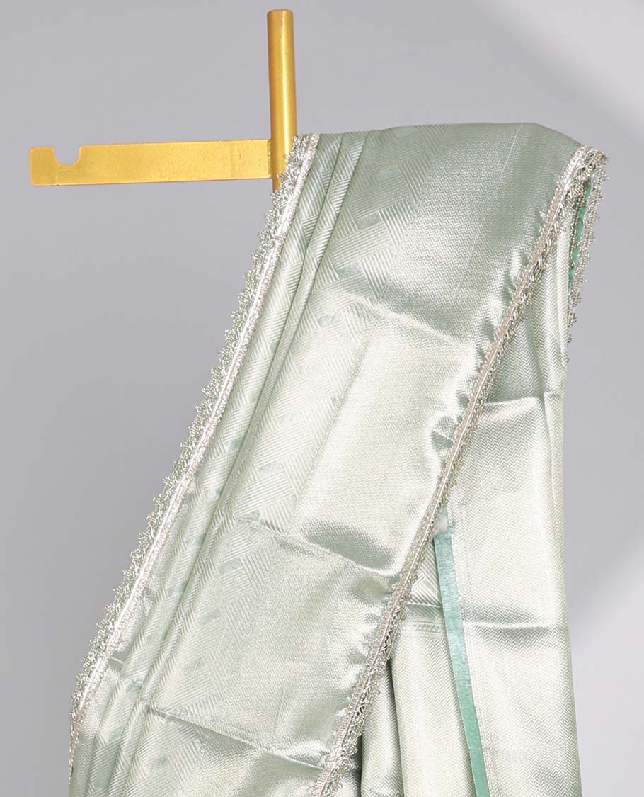 Mint green geometric design with self zari design border & intricate design pallu