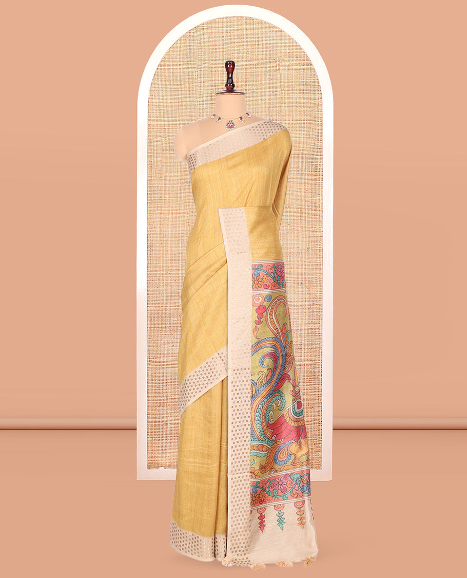 Mustard Plain Fancy Tussar Saree, Complemented by a Contrast Hashtag Motif Border, Kalamkari Flora-Fauna Printed Pallu, and a Contrast Blouse
