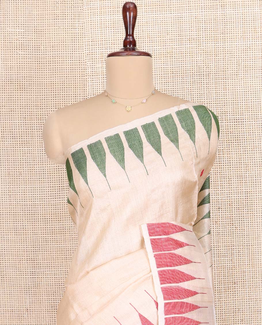 Cream Tussar Silk Saree, Finely Woven with Multi-Color Thread Buttas All Over Its Body, Subtly Sparkled with Temple Border, Pallu Depicts Flower Butta Enclosed Jaal Designs, and Paired with a Matching Blouse