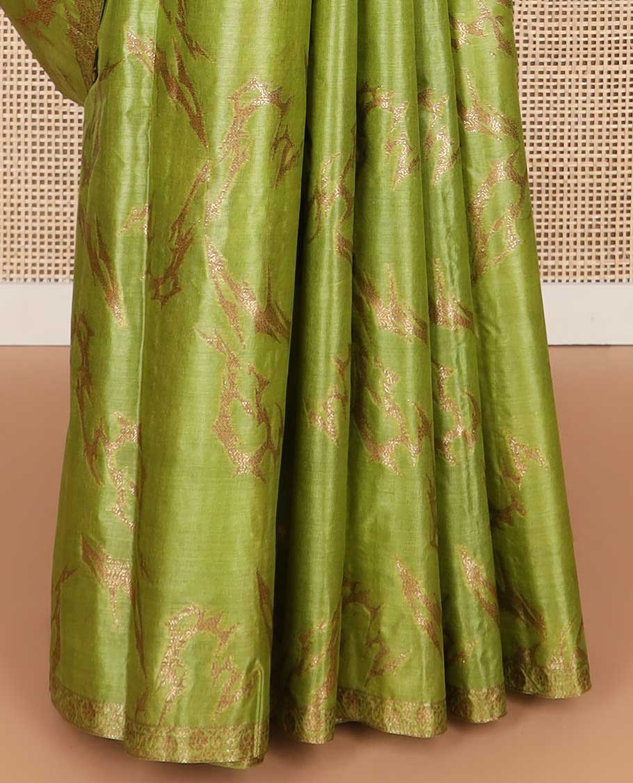 Green abstract design tussar silk saree with self zari design border & floral design pallu