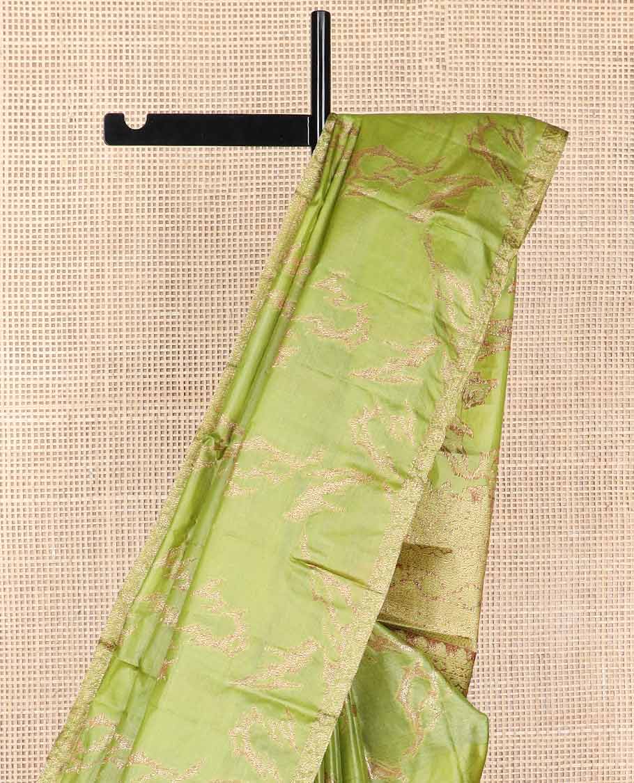 Green abstract design tussar silk saree with self zari design border & floral design pallu