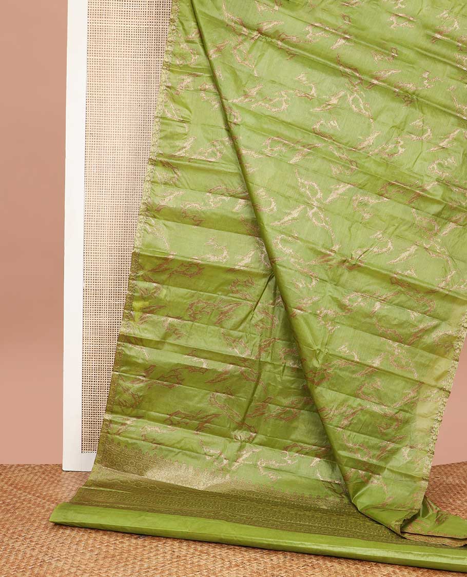 Green abstract design tussar silk saree with self zari design border & floral design pallu