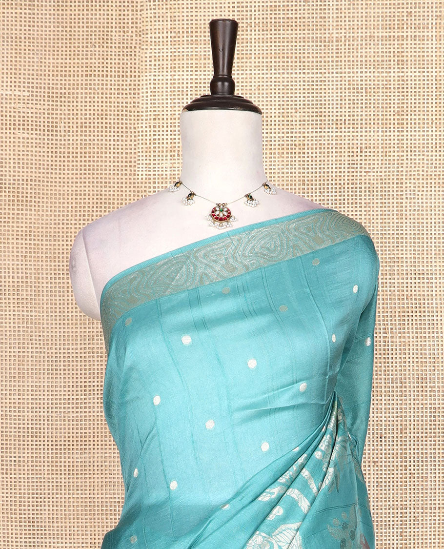 Blue Matka silk saree with polka dots and birds on the branches meenakari design, geometric border, and pallu mirrors the same design