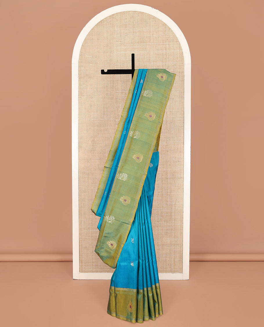Blue Uppada Silk Saree, Beautified with Floral Buttas All Over Its Body, Complemented by a Contrast Border of Meena Buttas, Pallu of Paisley Butta Enclosed Checks, and Paired with a Contrast Blouse