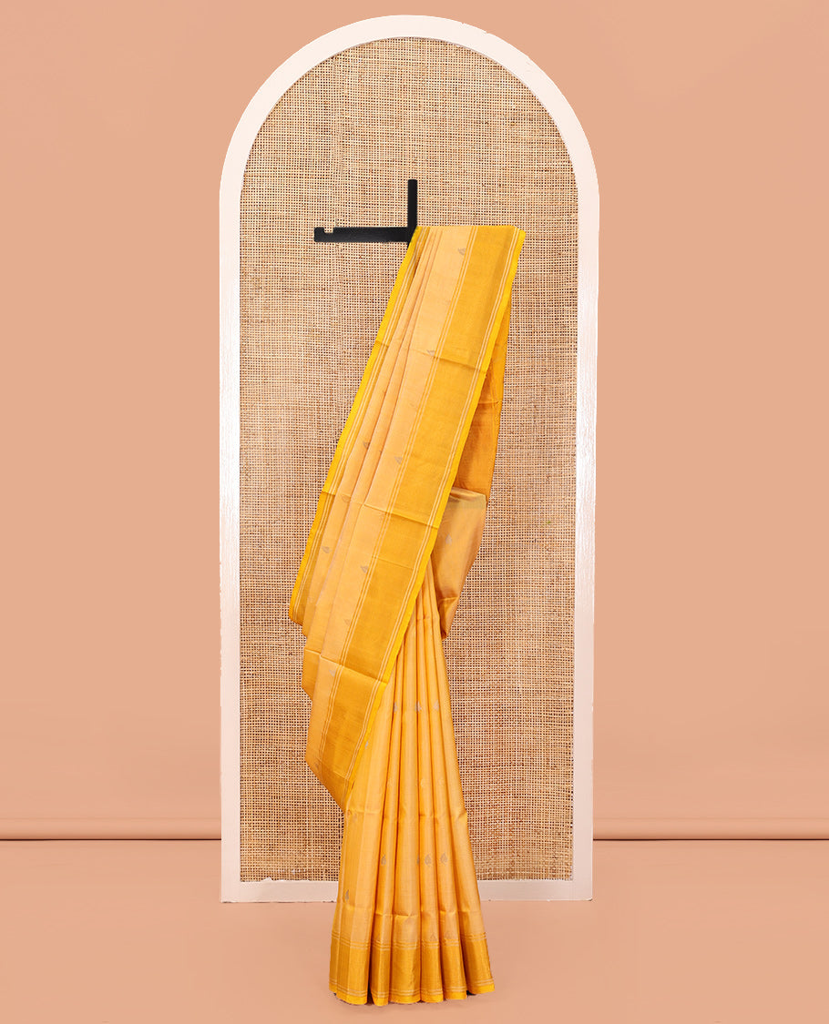 Yellow Uppada Silk Saree, Subtly Sparkled with Buttas, a Contrast Zari Border, Pallu of Mughal-Style Jaal Designs, and a Contrast Blouse