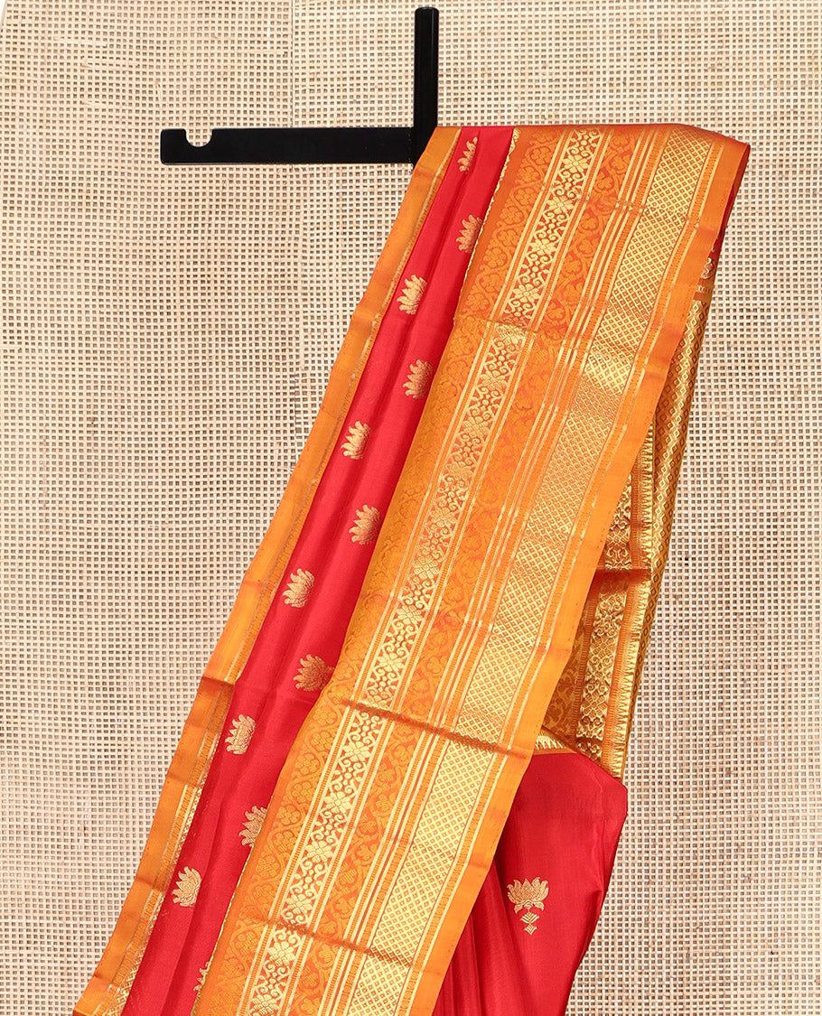 Red Venkatagiri Silk Saree, Mesmerized with Pichwai Lotus Buttas All Over Its Body, Complemented by a Contrast Traditional Zari Design Border, Pallu of Jaal Designs, and Paired with a Contrast Blouse