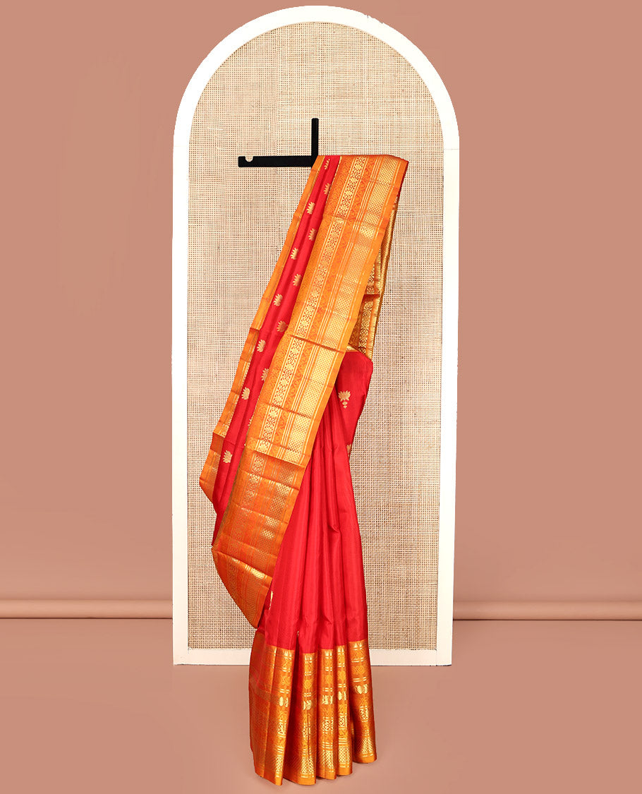 Red Venkatagiri Silk Saree, Mesmerized with Pichwai Lotus Buttas All Over Its Body, Complemented by a Contrast Traditional Zari Design Border, Pallu of Jaal Designs, and Paired with a Contrast Blouse