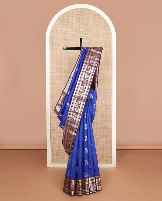 Blue floral buttas Vasundhara silk mix saree, contrast border of thilakam,banaras,muthu,kamalam,jada nagam & kodi visiry & chevron pallu