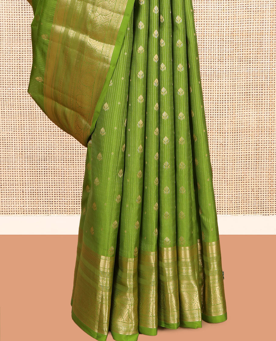 Green Vasundhara Lite Silk Mix Saree, Subtly Sparkled with Zari Buttas and Stripes, a Zari Border of Muthu, Kamalam, and Kodi Visiry, Jaal Pallu, and a Matching Blouse