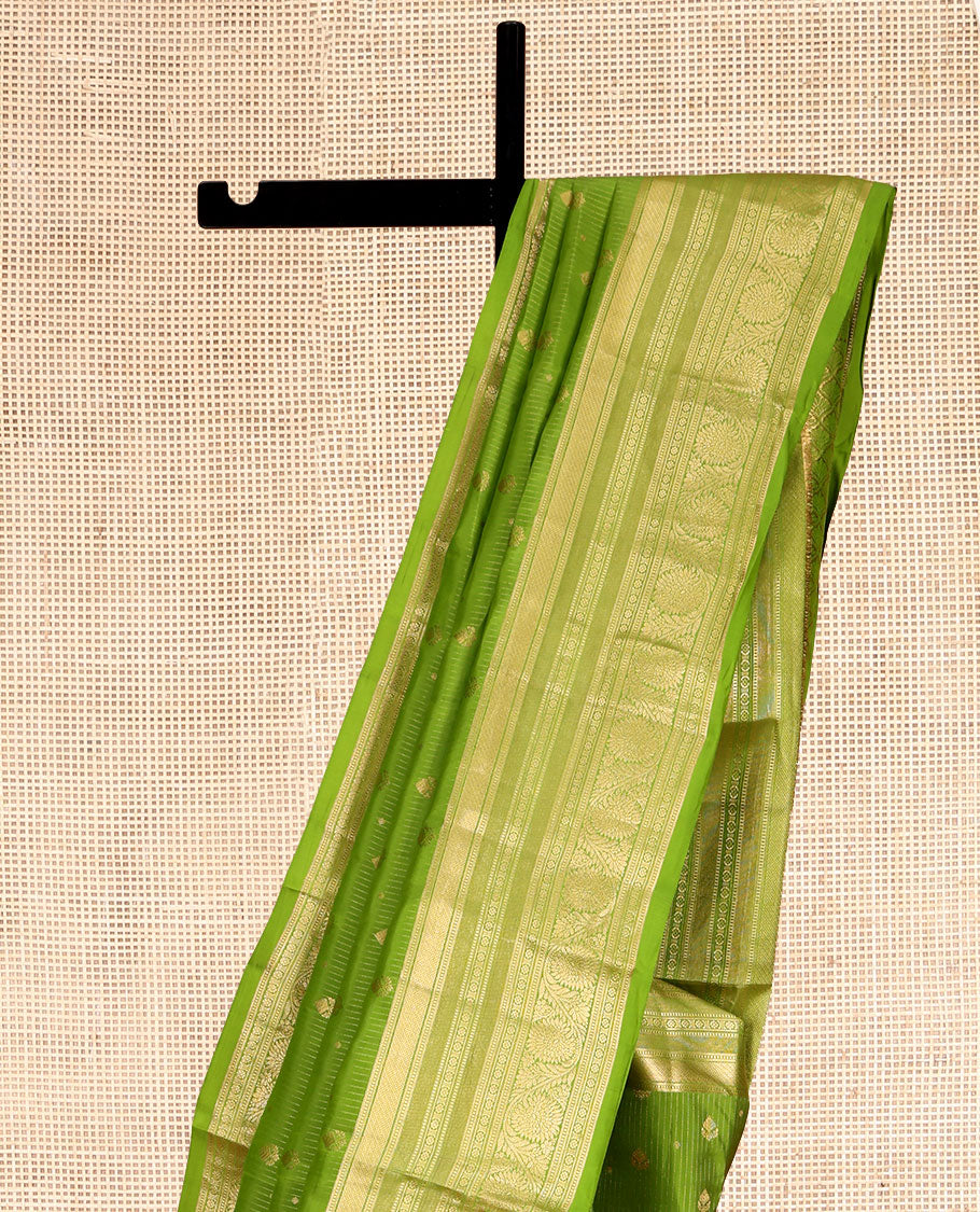 Green Vasundhara Lite Silk Mix Saree, Subtly Sparkled with Zari Buttas and Stripes, a Zari Border of Muthu, Kamalam, and Kodi Visiry, Jaal Pallu, and a Matching Blouse