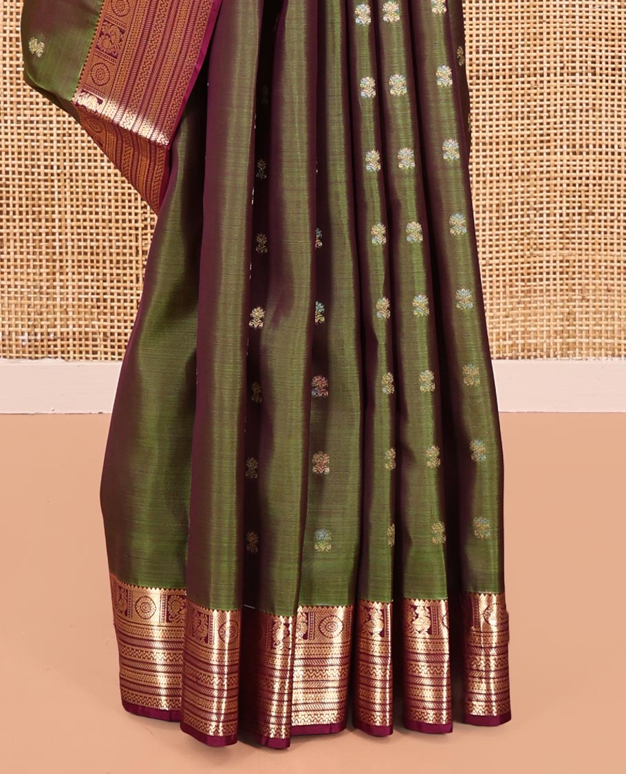Green Vasundhara Silk Saree, Crafted with Zari Buttas All Over Its Body, Complemented by a Contrast Border of Rekku, Chakram, Neli, and Banaras Designs, Intricately Designed Pallu, and Paired with a Contrast Blouse