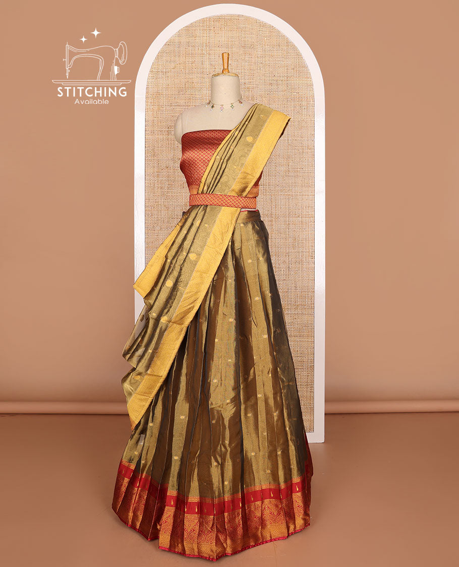 Olive green buttas tissue half saree with contrast zari design border, checked zari design blouse & floral design dhavani