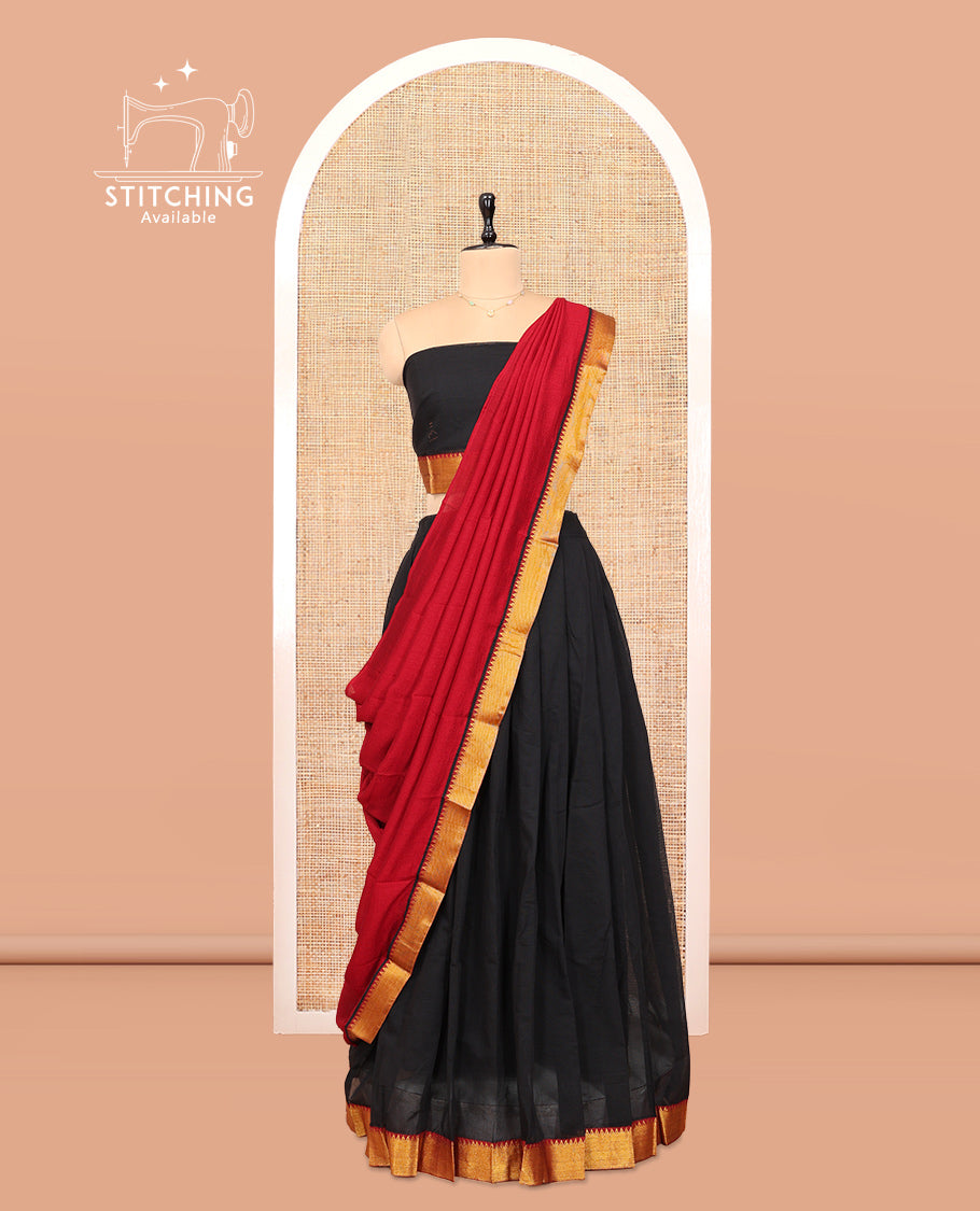 Black Cotton Half-Saree Features Plain Skirt, a Contrast Temple Zari Border, a Matching Blouse, and a Contrast Dhavani