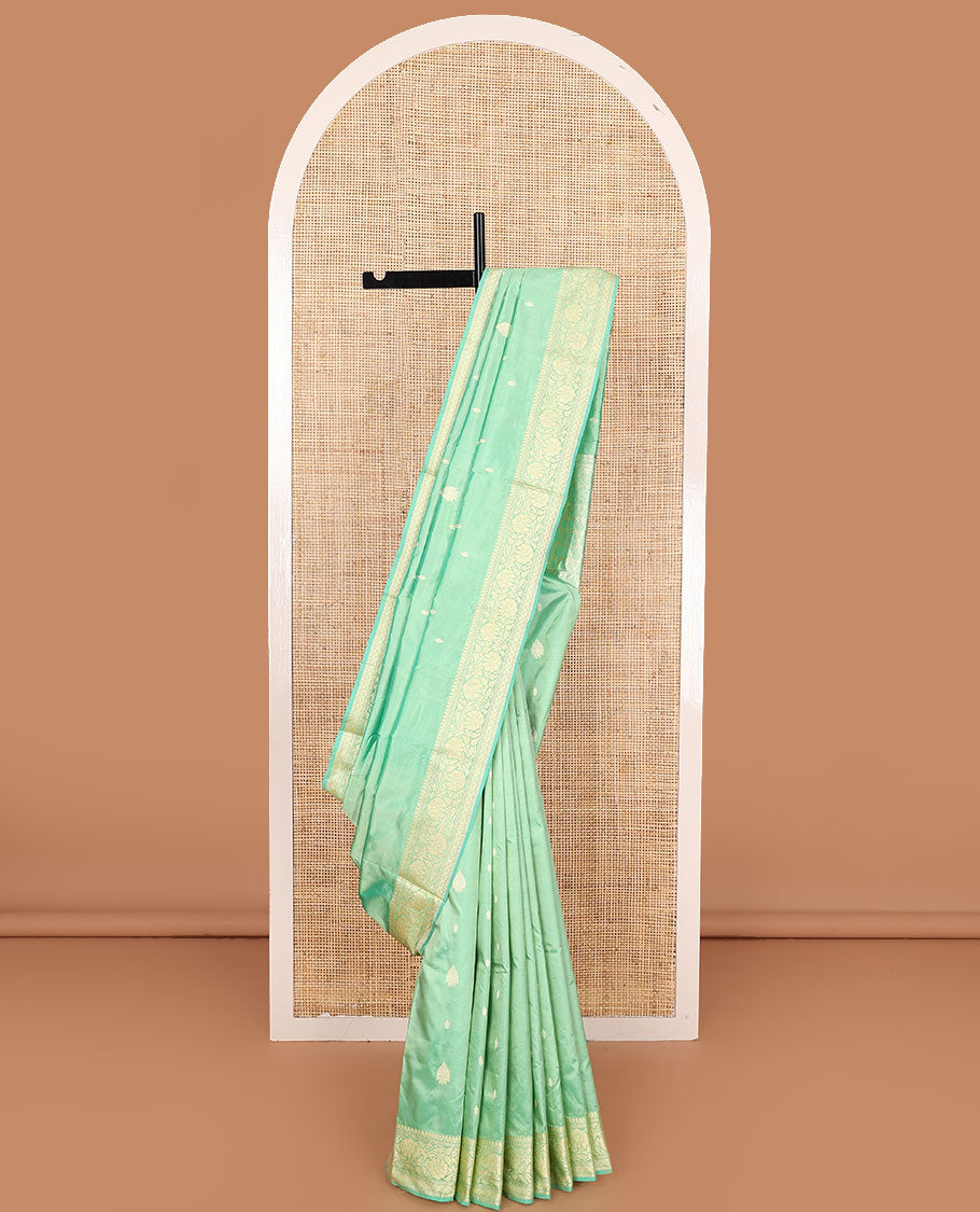 Green buttas kathan silk saree, floral creeper border, and intricately woven pallu
